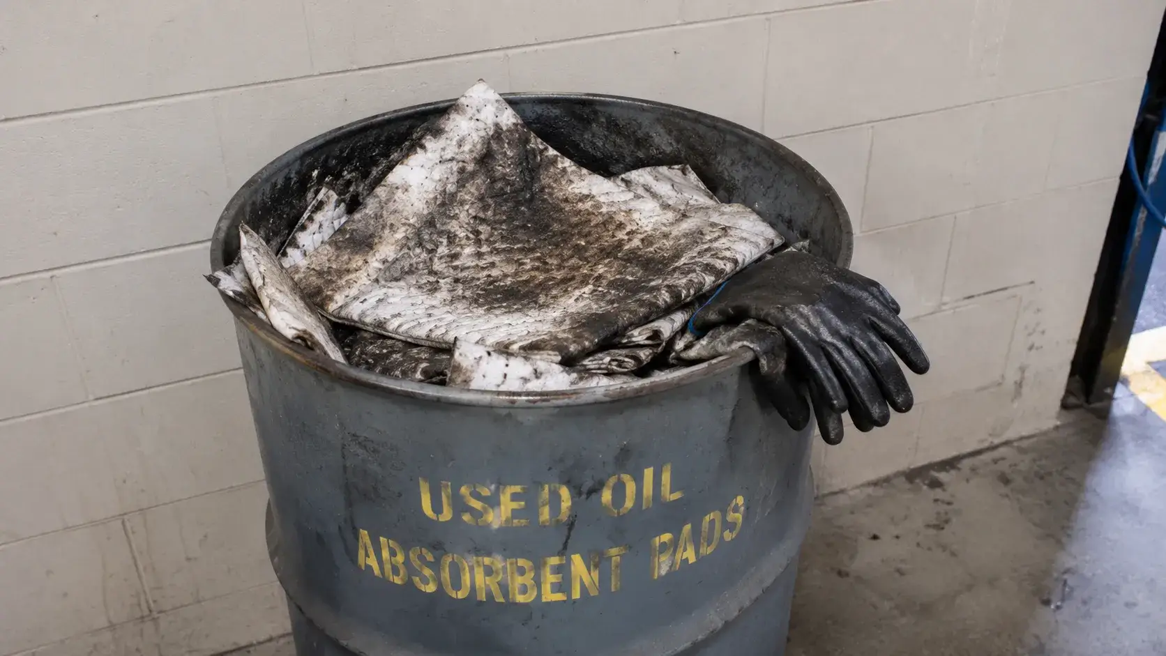 Used oil-soaked absorbent pads